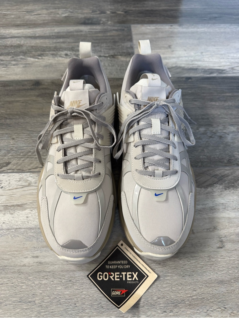 Nike Women’s GORE-TEX Light Gray Athletic Sneakers with Blue Swoosh